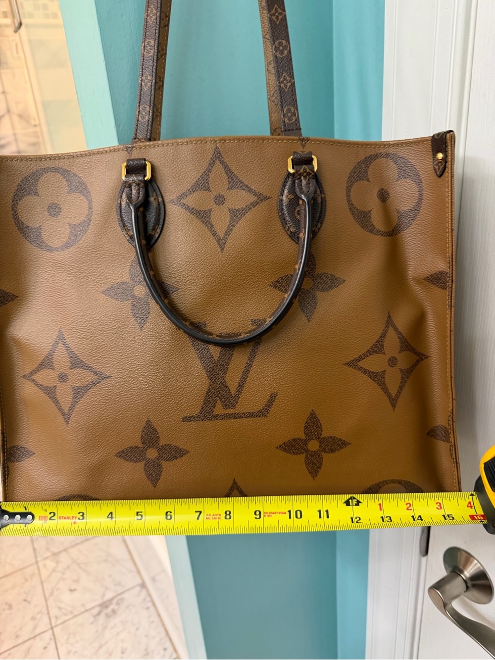 Louis Vuitton GM Monogram Canvas Tote with Gold Hardware and Red Trim